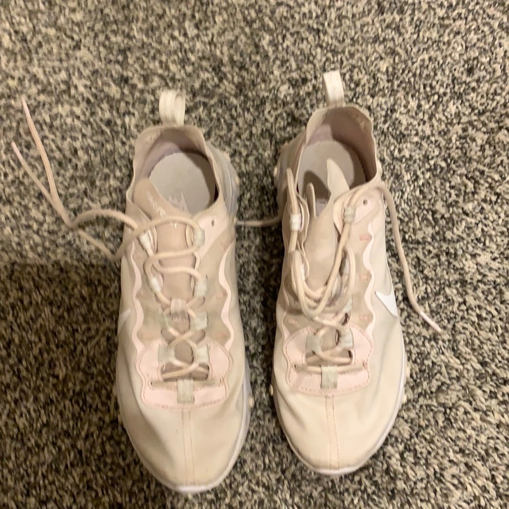 Pink Nike react tennis shoes